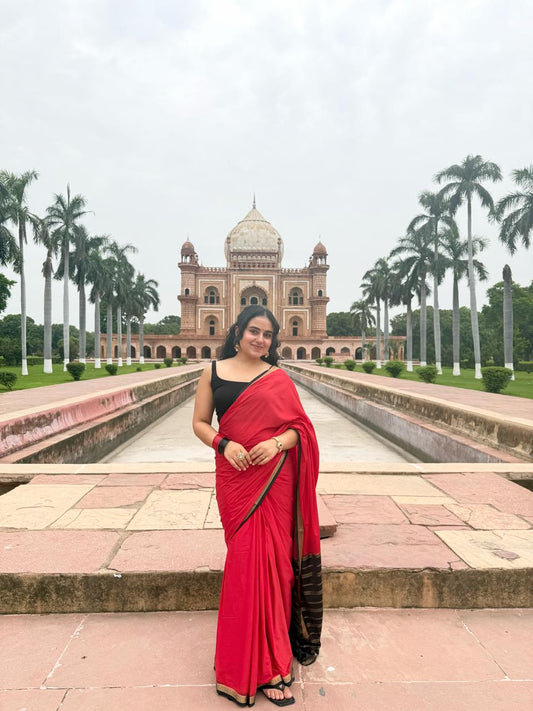 Red Plain Semi-Mysore Silk Saree, Complemented by a Contrast Traditional Zari Design Woven Border, Pallu Subtly Sparkled with Zari Stripes, and Paired with a Contrast Blouse