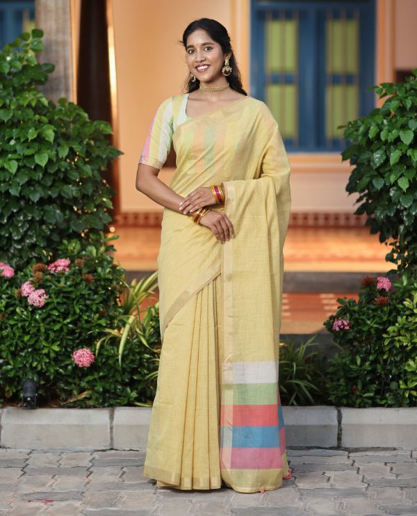 Yellow Plain Semi-Tussar Saree, a Zari Border, Multi-Colored Striped Pallu, and a Contrast Blouse