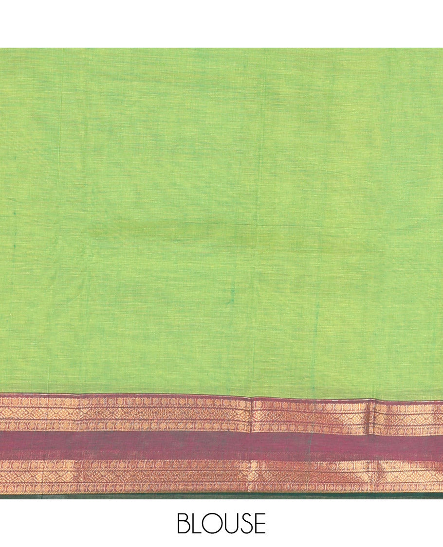 Green Chettinad Cotton Saree Delicately Woven with Buttas on Its Body, Complemented by a Contrast Traditional Zari Design Woven Rettai Pettu Border, and Elegantly Highlighted Pallu