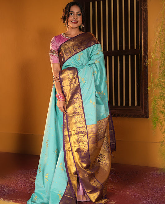 Light Blue and Purple Budget Silk Saree, Graced with Zari Buttas on Its Body, Complemented by a Contrast Traditional Zari Design Border of Paisleys, Pallu of Paisley Designs, and Paired with a Contrast Blouse