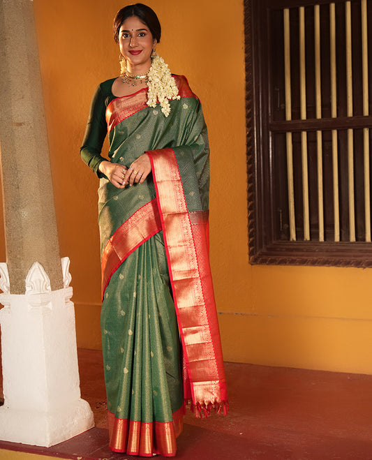 Green and Red Budget Silk Saree, Delicately Woven with Zari Buttas and Checks on Its Body, Complemented by a Contrast Traditional Zari Border of Peacock Designs, Grand Pallu, and Paired with a Contrast Blouse
