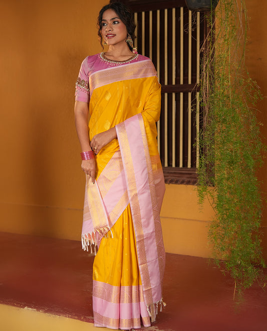 Turmeric Yellow and Light Pink Budget Silk Saree, Decorated with Zari Designs on Its Body, Complemented by a Contrast Rettai Pettu Traditional Zari Border, Grand Jaal Pallu, and Paired with a Contrast Blouse