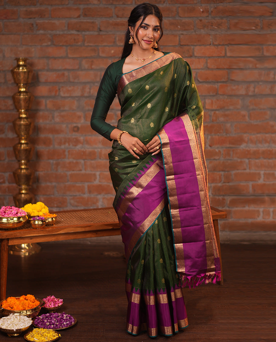 Dark Green and Magenta Vasundhara Silk Saree, Elevated with Zari Buttas and Zari Checks On Its Body, Complemented by Contrast Thazampoo Rekku Rettai Pettu Border of Salngai, and Mayil Designs, Grand Pallu, and Paired with a Contrast Blouse