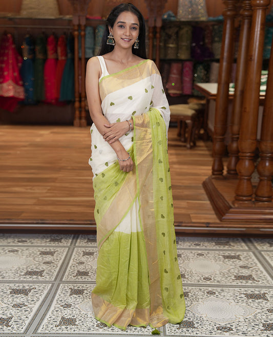 Cream and Pista Green Khadi Mul Cotton Saree, Adorned with Half-And-Half-Style and Heart Motifs Embroidery on Its Body, a Subtle Gold Zari Border, a Self-Pallu, and Has No Blouse