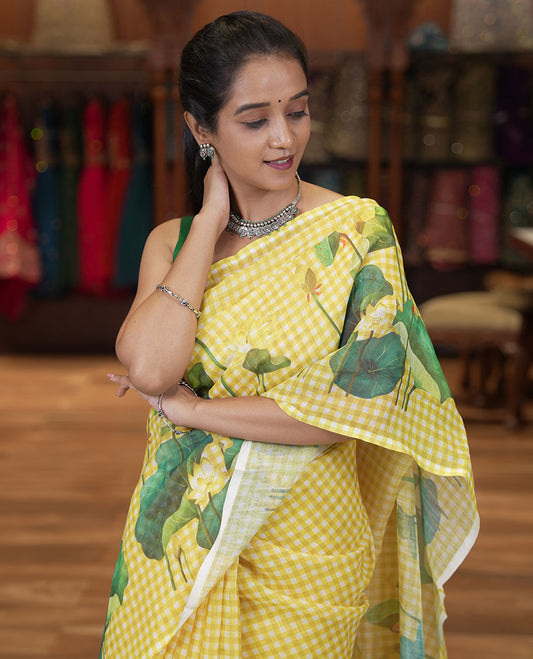 Borderless Yellow Linen Cotton Saree, Adorned with Micro-Checks and Pichwai Lotus Print, a Subtle Pallu, and a Matching Blouse