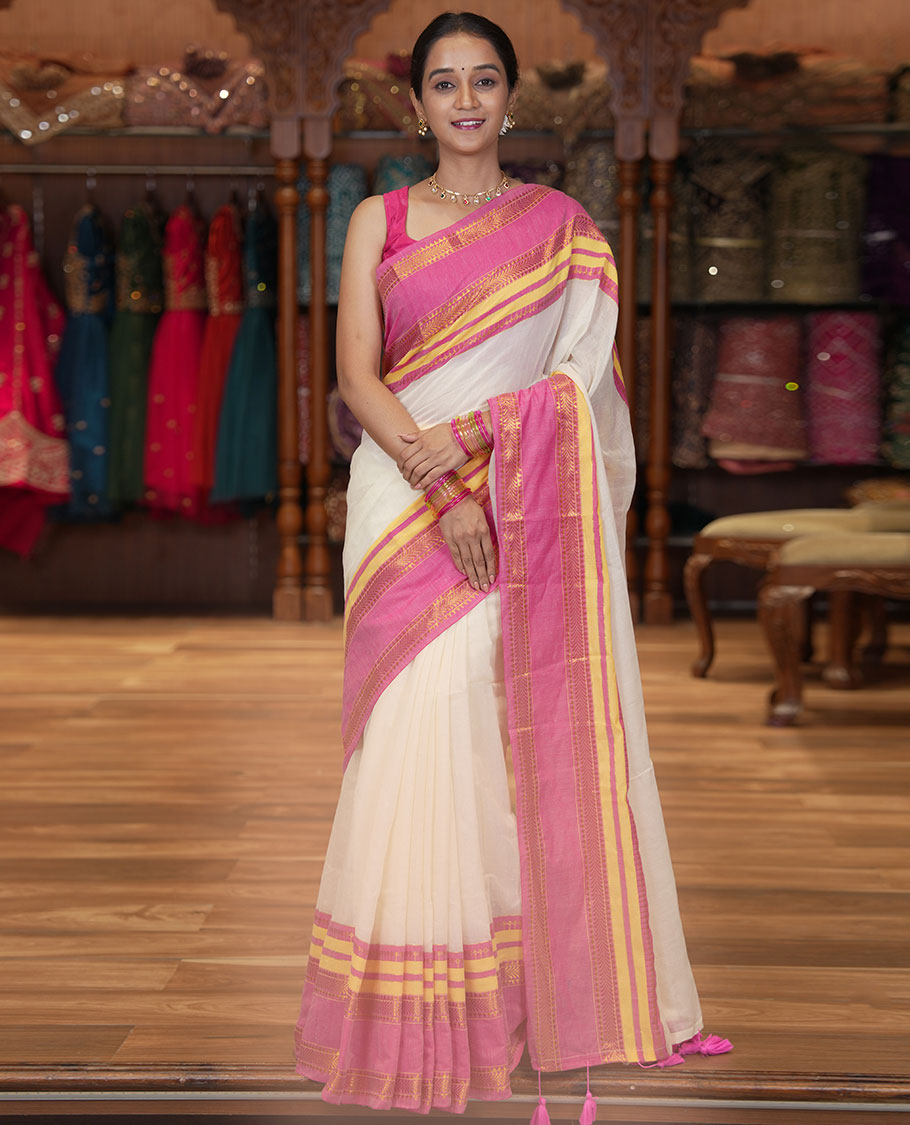 Cream Plain Khadi Mul Cotton Saree, Complemented by a Contrast Traditional Zari Varisai Pettu Border, and a Matching Blouse