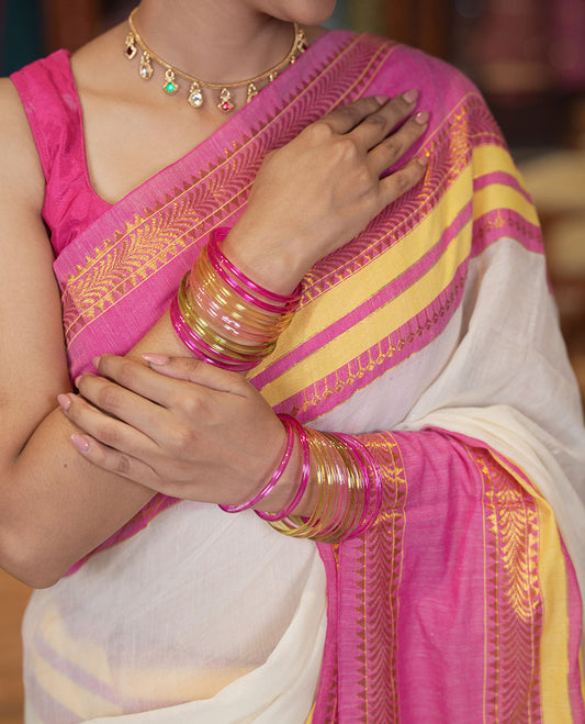 Cream Plain Khadi Mul Cotton Saree, Complemented by a Contrast Traditional Zari Varisai Pettu Border, and a Matching Blouse