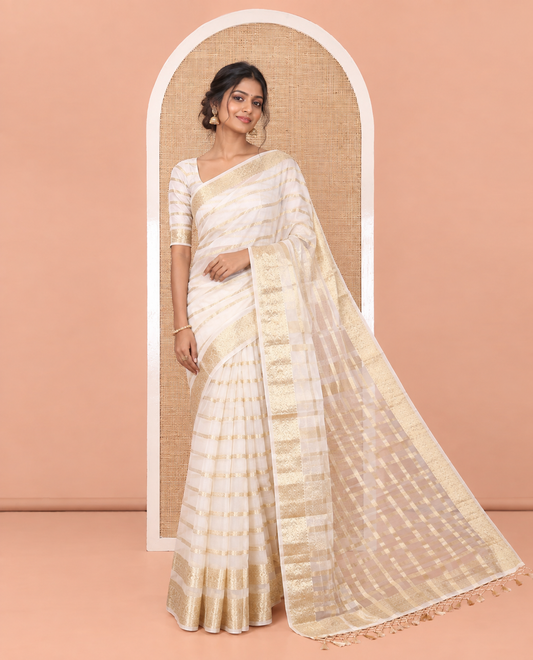 Cream Semi-Organza Saree, Steeped in Richness of Horizontal Zari Stripes All Over Its Body, Highlighted by a Traditional Zari Design Border, Gleaming Zari Design Pallu, and Paired with a Matching Blouse