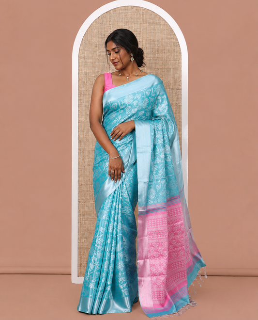 Blue Tissue Cotton Saree Features Floral Vine Design, a Zari Border, Contrast Intricate Pallu, and a Contrast Blouse