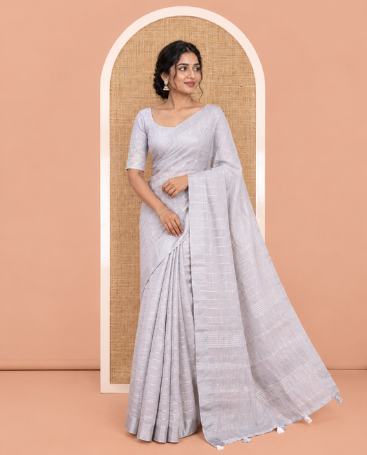 Grey Jute Linen Cotton Saree, Adorned with Checked Design on Its Body, a Subtle Self-Border, Striped Pallu, and Paired with a Matching Thread Embroidered Blouse