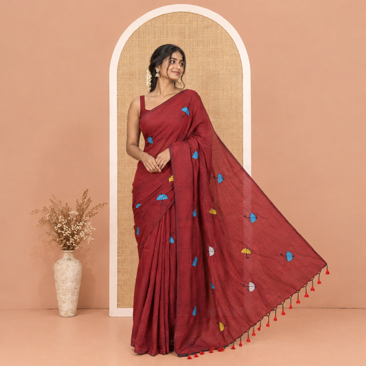 Borderless Maroon Khadi Cotton Saree, Delicately Woven with Umbrella Motifs, Thread Embroidered on Its Body, a Self-Pallu, and Paired with a Matching Blouse