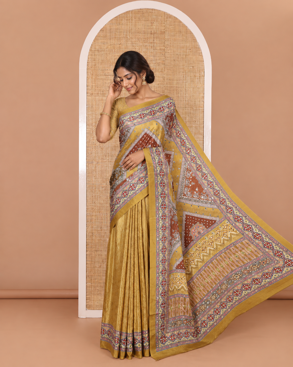 Mustard bandhani dots, geometric print, and mirrorwork masakali saree, printed border, printed and mirrorwork pallu, and a matching printed blouse