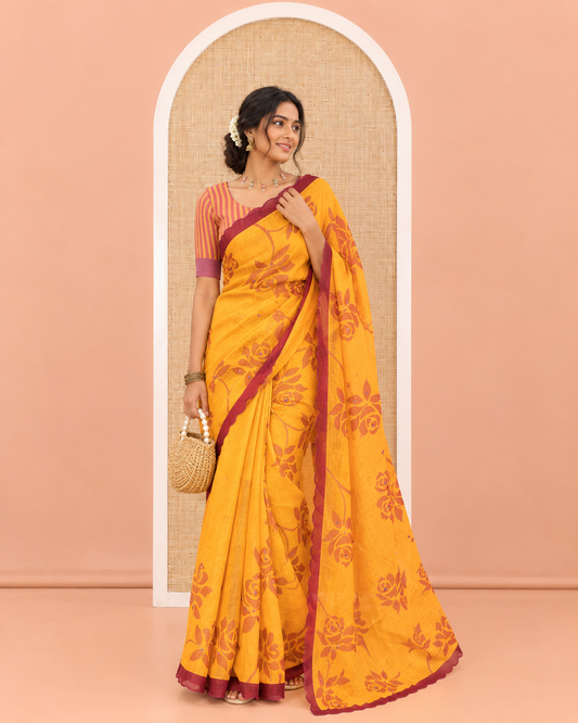 Yellow Linen Cotton Saree, Adorned with Floral Print and Mirror Work on Its Body, Complemented by Contrast Scallop Border, Pallu of Print and Mirror Work, and Paired with a Matching Blouse