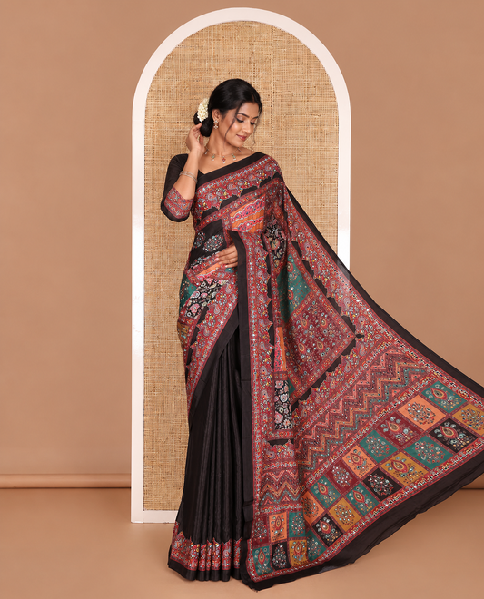 Black kaleidoscopic colored floral-geometric printed with mirrorwork masakali saree, printed border, print with mirror work pallu, and a matching blouse