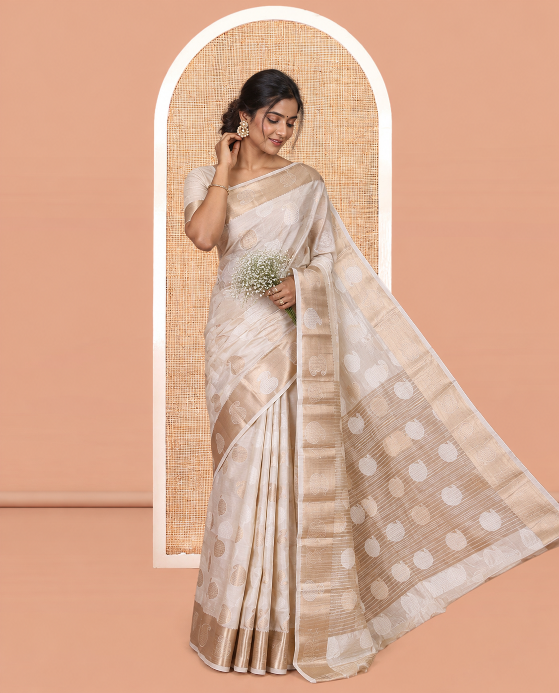 Cream Semi-Tussar Saree Features Paisley Buttas, a Zari Paisley Border, and a Matching Blouse