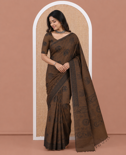 Brown South Cotton Saree Features Leaf and Elephant Motifs Print, a Subtle Printed Border, and a Matching Blouse
