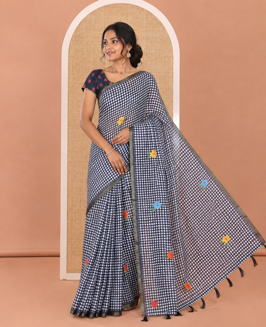 Navy Blue Linen Cotton Saree, Beautiful Decked Up with Checks and Floral Motifs Printed All Over Its Body, Subtle Piping Border, Pallu Mirrors the Same Design, and Paired with a Printed Blouse