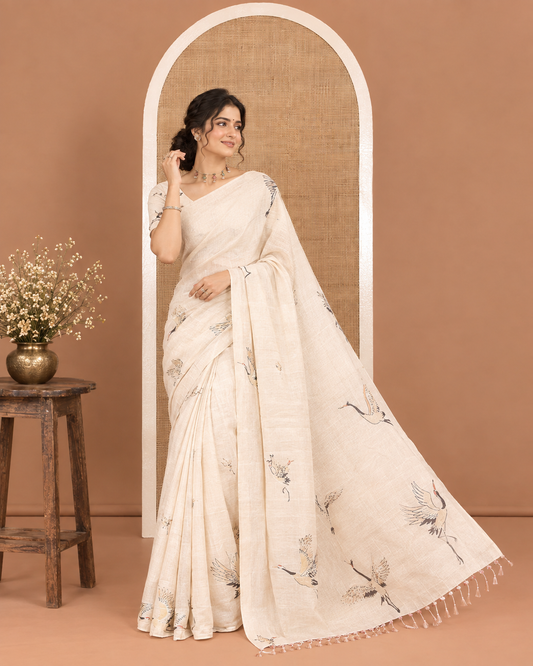 Borderless Gold Tissue Saree, Enthralled with Crane Motifs on Its Body, Self-Pallu Features the Same Crane Motifs Print, and Paired with a Matching Crane Motifs Printed Blouse