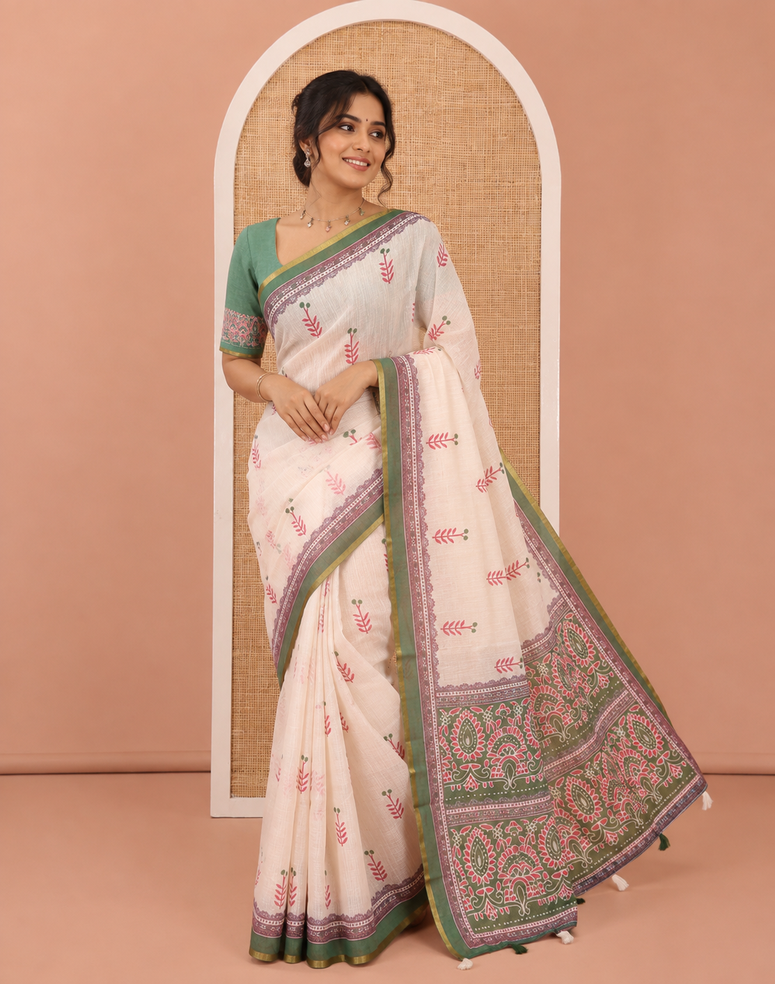 Cream-Green Linen Cotton Saree Features Floral Buttas, Contrast Printed Border, Intricate Pallu, and a Contrast Blouse