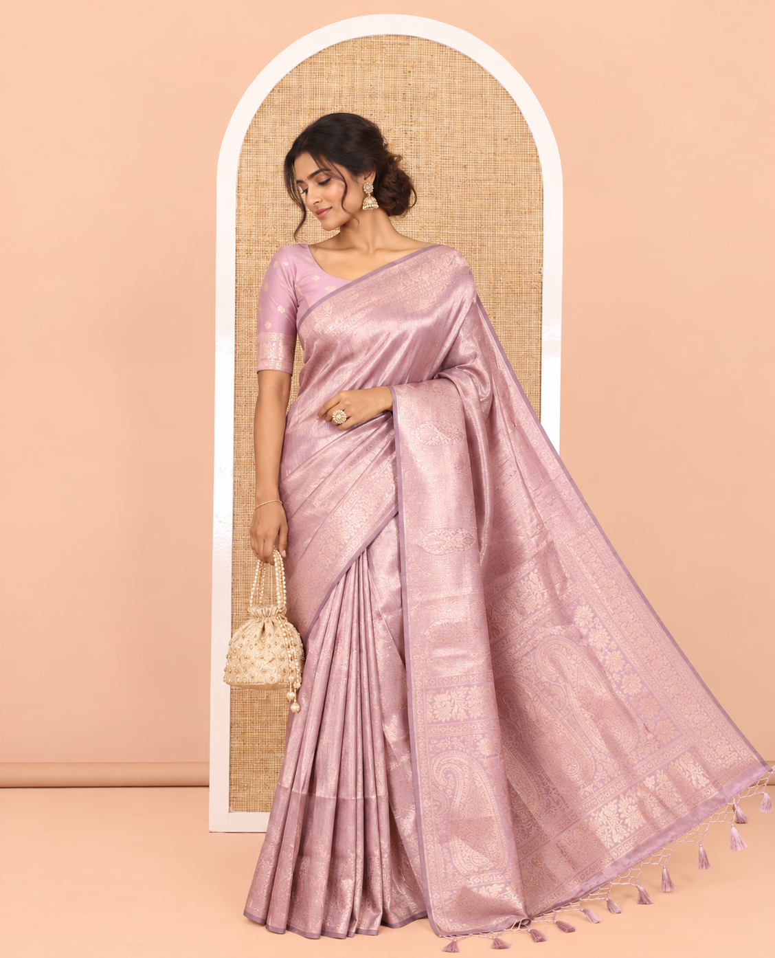 Lavender Elite Soft Silk Saree Features Jacquard Design, a Zari Border, Paisley Pallu, Matching Blouse
