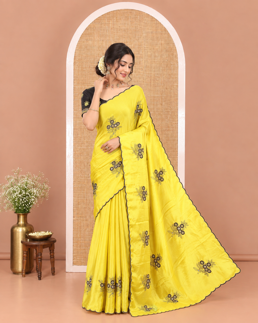 Yellow Rangoli Chiffon Saree, Beautified with Flower-Style Motifs Embroidered on Its Body, a Subtle Scallop Embroidered Border, a Self-Pallu, and Paired with a Contrast Embroidered Blouse