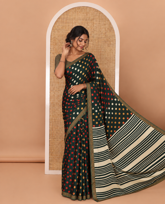 Green colorful polka dots printed satin crepe saree, contrast piping border, stripes printed pallu & contrast printed blouse