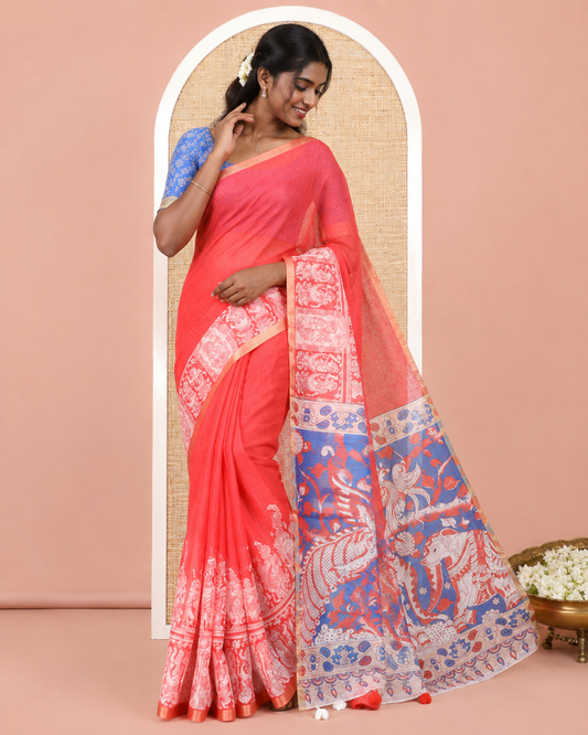 Tomato Pink Linen Cotton Saree Features Kalamkari-Style Human Motifs Print, a Piping Border, Contrast Printed Pallu, and Contrast Blouse