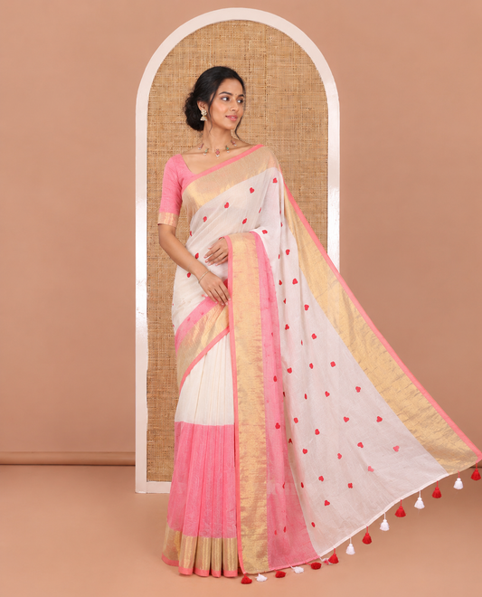 Peach heart motifs, red thread-embroidered half-and-half khadi mul cotton saree, zari border, self-pallu, and a plain blouse