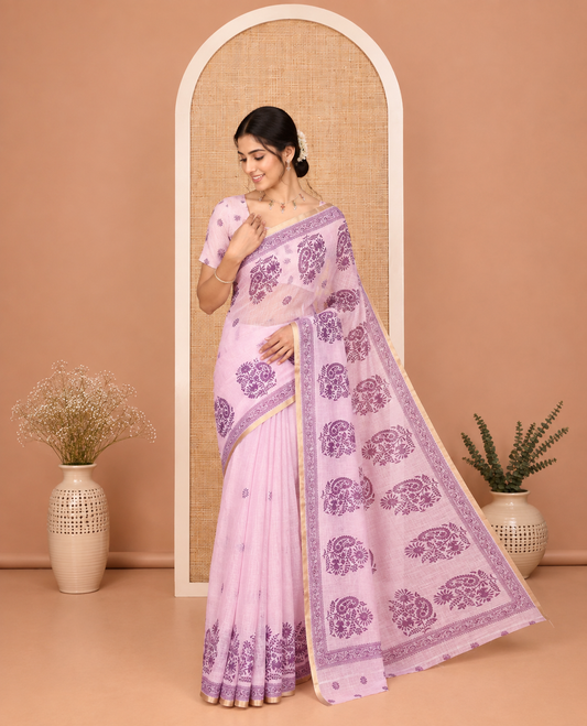 Pink Linen Cotton Saree, Beautiful Designed with Floral-Paisley Motifs Print All Over Its Body, Highlighted by Gold Zari Printed Border, Floral-Paisley Printed Pallu and Paired with a Matching Blouse