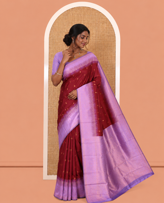 Maroon Art Kanchi Silk Saree, Adorned with Buttas, a Contrast Traditional Zari Border, Intricate Pallu, and a Contrast Blouse