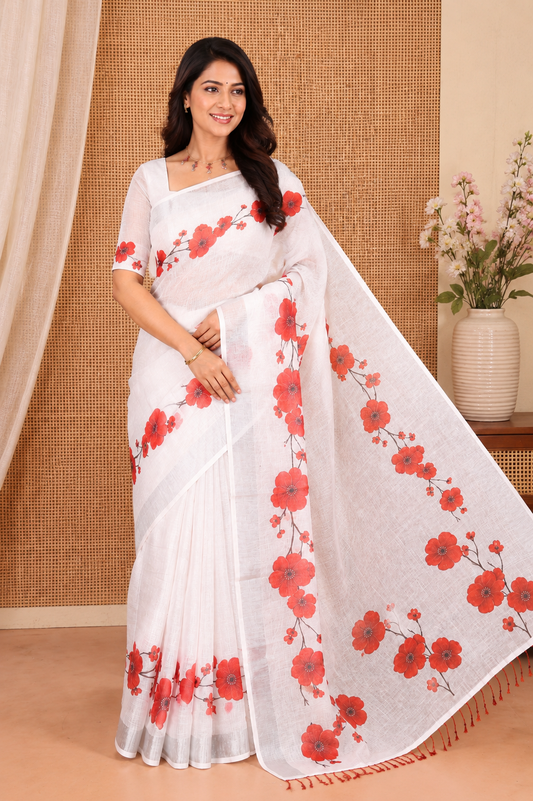 White-Red Linen Cotton Saree, Beautified with Floral Print, a Subtle Zari Border, and a Matching Blouse
