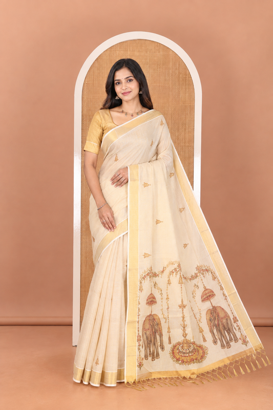 Gold Kerala Cotton Saree, Graced with Bell Motif Print, a Zari Border, Pallu of Elephant Motifs, and a Contrast Blouse