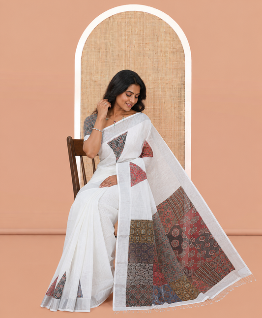 Cream Linen Cotton Saree, Embellished with Triangle Print, a Subtle Zari Border, Ajrakh Patch Printed Pallu, and a Contrast Blouse