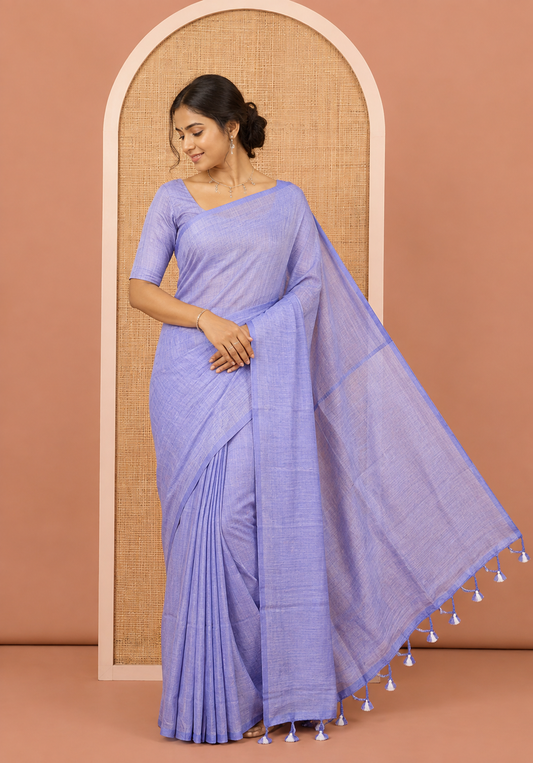 Borderless Blue Plain Khadi Cotton Saree, a Self-Pallu with Tassels, and a Matching Blouse