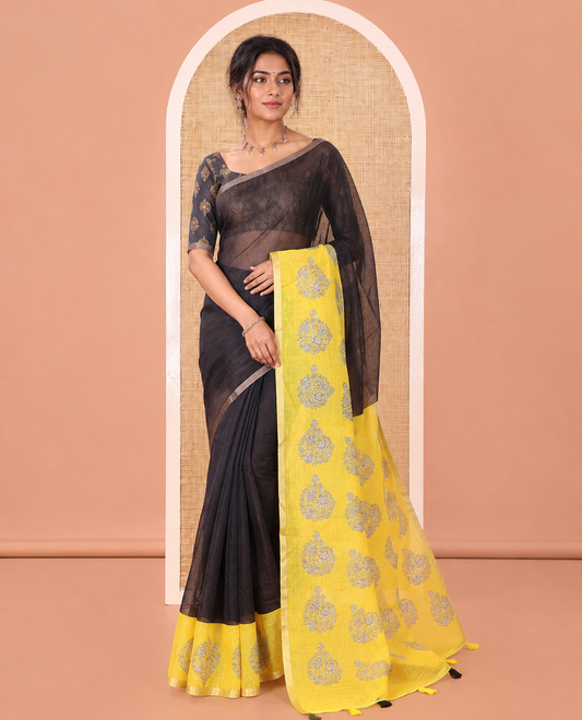 Black Plain Linen Cotton Saree, Complemented by Captivating Contrast Floral Motifs Printed Border, Printed Pallu, and Paired with a Printed Blouse