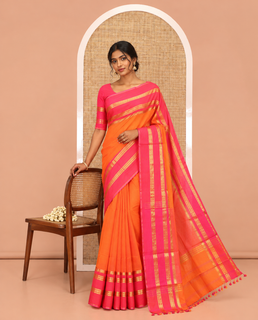 Orange Plain Khadi Mul Cotton Saree, Complemented by a Contrast Traditional Zari Design Border, a Self-Pallu, and a Matching Blouse