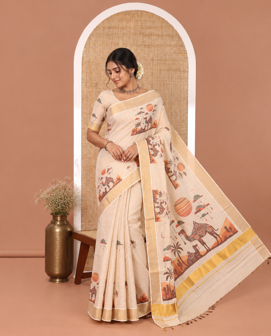 Light Gold Kerala Tissue Saree, Elevated with Desert-Themed Camel Motifs Printed on Its Body, Highlighted by a Zari Border, Desert-Theme Printed Pallu, and Paired with a Matching Blouse
