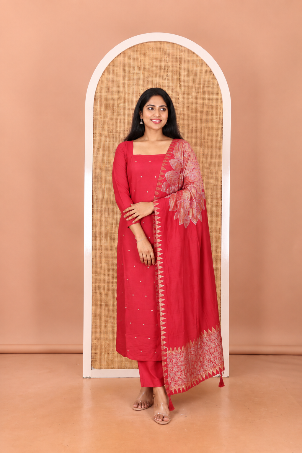Red Semi-Silk Material Churidar Features Zari Buttas Top, a Plain Bottom, and a Floral Motif Zari Woven Dupatta