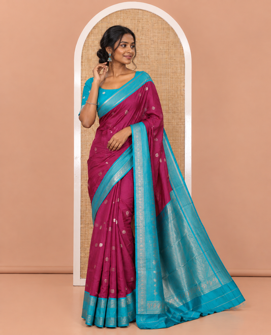 Magenta Kanchi Silk Saree Features Mayil-Chakram Buttas, a Contrast Traditional Border, Jaal Pallu, and a Contrast Blouse