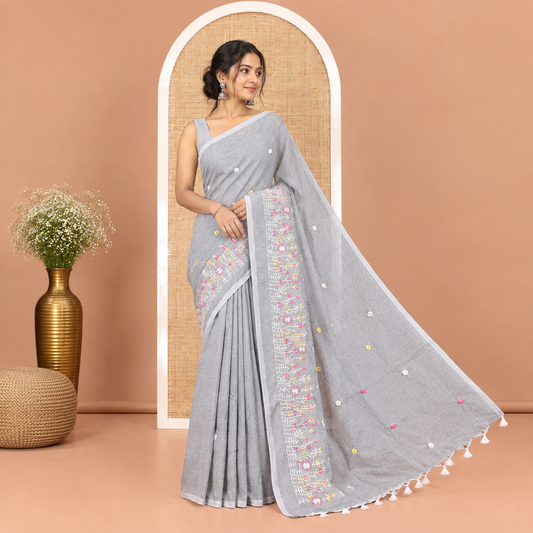 Borderless Grey Khadi Cotton Saree, Delicately Woven with Flower Motifs Embroidery All Over Its Body, a Self-Pallu, and Paired with a Matching Blouse