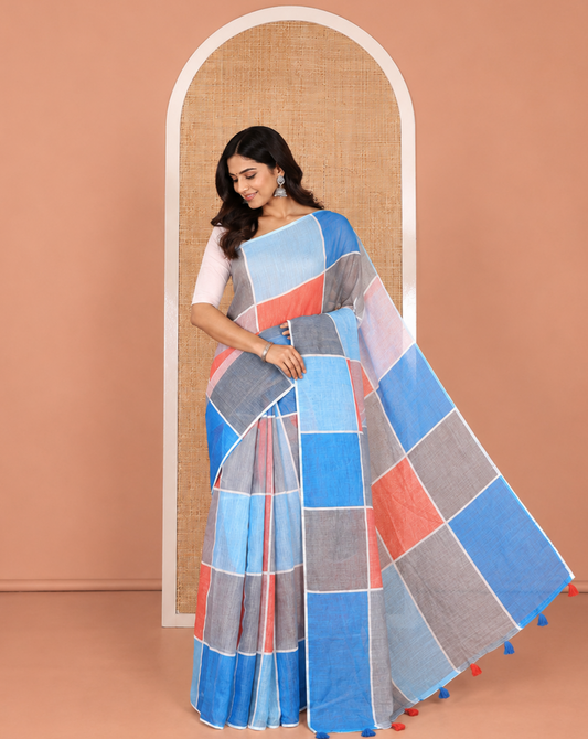 Borderless Multi-color Linen Cotton Saree, Accentuated with Big Colorful Solid Checks On Its Body, Self-Pallu of Tassels, and Paired with a Contrast Plain Blouse