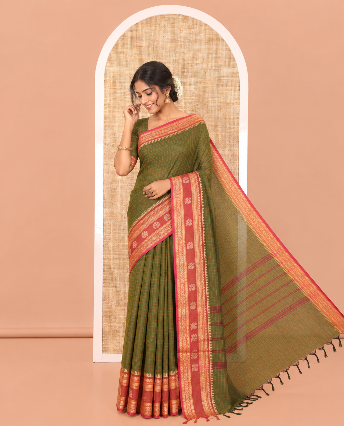 Green Chettinad Cotton Saree, Subtly Sparkled with Checks on Its Body, Complemented by a Contrast Traditional Border of Peacock Designs, Subtly Striped Pallu, and Paired with a Matching Blouse