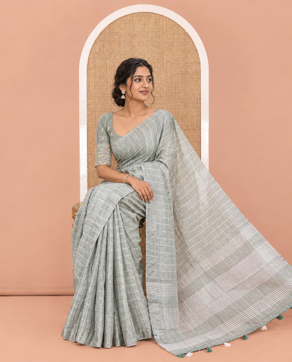 Green Jute Linen Cotton Saree, Adorned with Checked Design on Its Body, a Subtle Self-Border, Striped Pallu, and Paired with a Matching Thread Embroidered Blouse