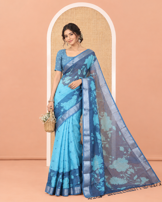 Blue Linen Cotton Saree, Beautified with Silhouette-Style Floral Vine Printed on Its Body, Subtly Zari Bavanji Border, Pallu of Same Floral Print, and Paired with a Matching Blouse