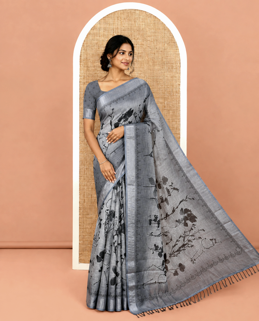Grey Linen Cotton Saree, Detailed with Silhouette-Style Floral Motifs Printed on Its Body, Subtle Zari Bavanji Border, Pallu of Silhouette-Style Floral Print, and Comes with a Matching Blouse