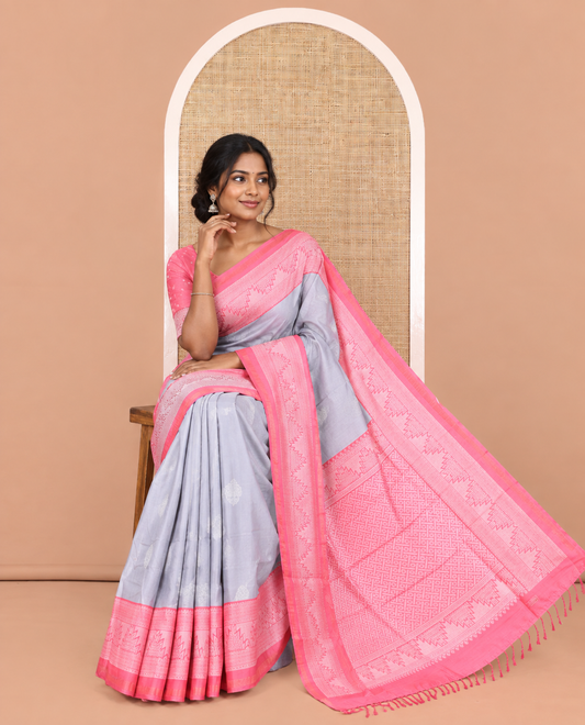 Grey Katan Silk Saree, Bedecked with Buttas, Complemented by Contrast Traditional Design Border, Geometric-Patterned Pallu, and a Contrast Blouse