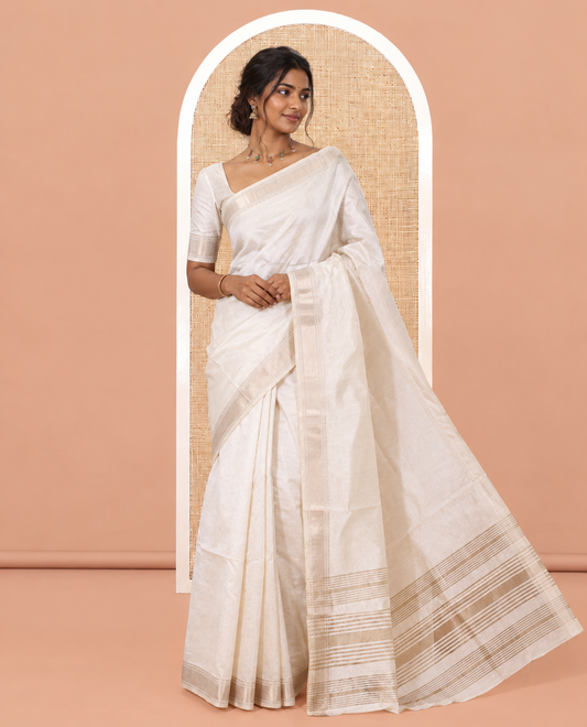 Cream Plain Semi-Tussar Saree, a Zari Traditional Border, a Self-Pallu, and a Matching Blouse