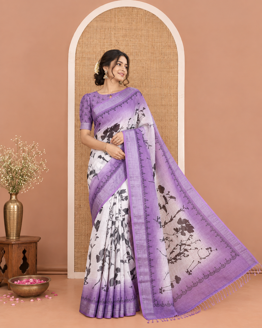 White and Violet Linen Cotton Saree, Elevated with Silhouette-Style Floral Motifs Printed on Its Body, Complemented by Contrast Bavanji Border, Pallu of Silhouette-Style Floral Print, and Comes with a Matching Blouse