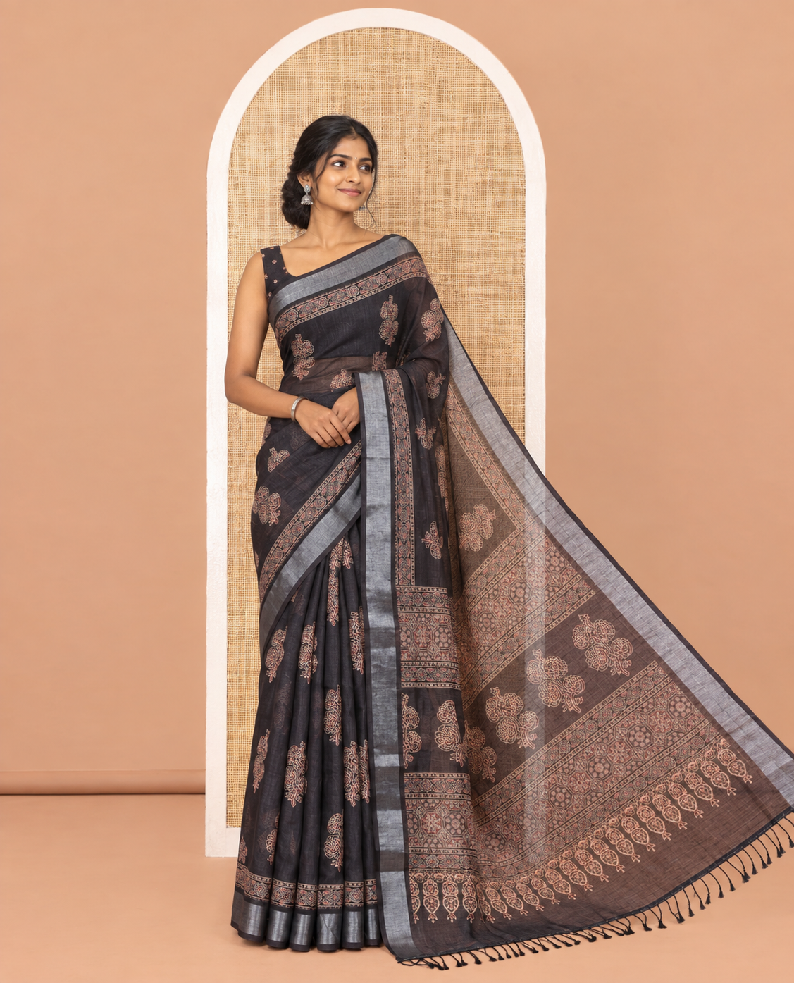 Black Linen Cotton Saree, Subtly Enriched with Ajrakh-Style Floral Motifs Block Print, a Subtle Zari Border, Pallu of Ajrakh-Style Intricate Print, and Paired with a Matching Blouse