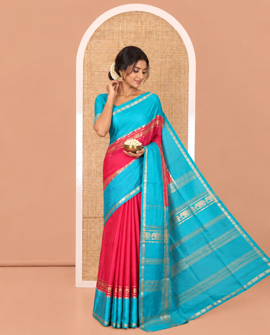 Pink Plain Art Mysore Silk Saree, Complemented by Captivating Contrast Rettai Pettu Traditional Border of Elephant Zari Buttas, Striped Pallu, and Paired with a Contrast Blouse
